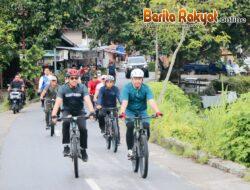 Berolah Raga Bersepeda Sambil Sosialisasi Pilkada Damai